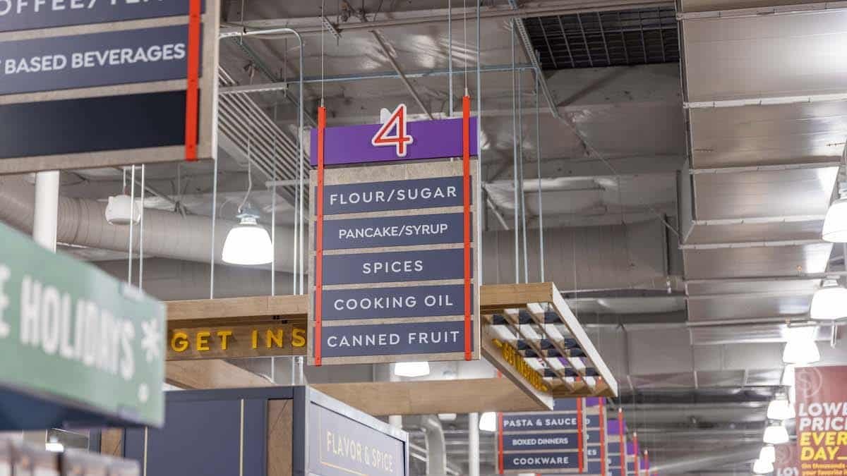 grocery store aisle signs in a supermarket designed by King Retail Solutions